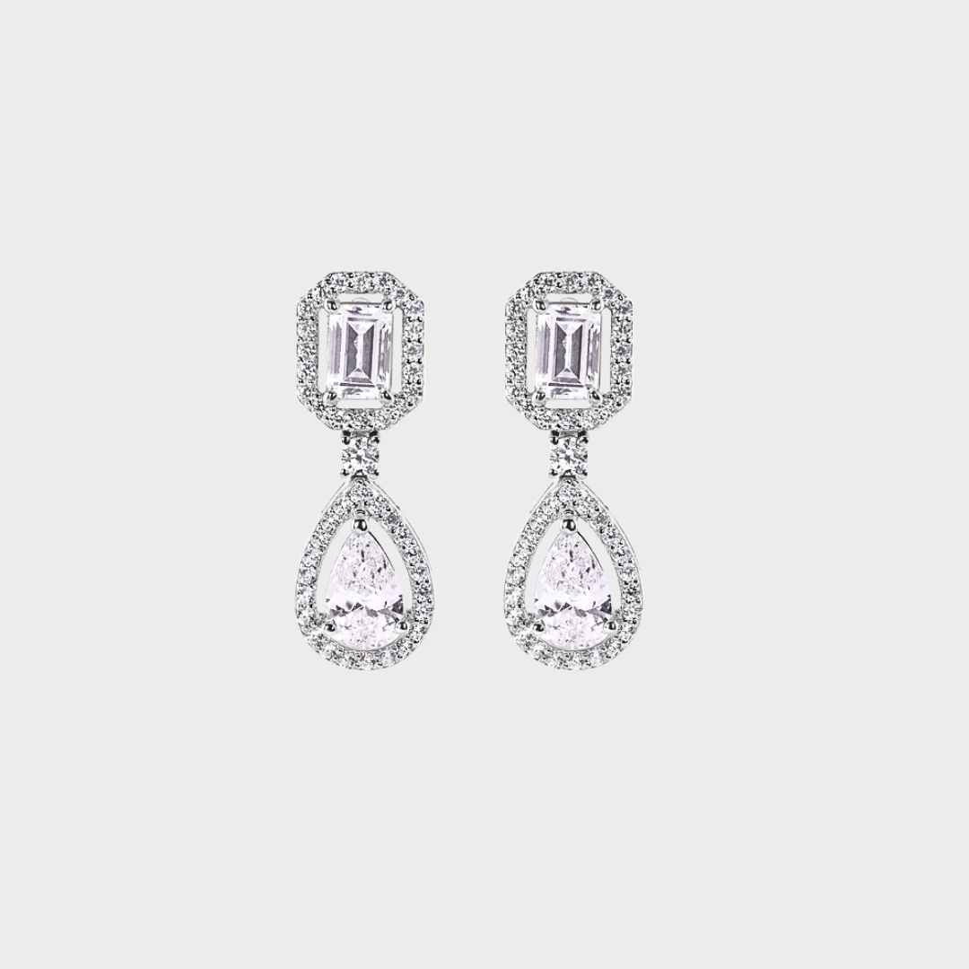Rhodium Plated 925 Sterling Silver Pear Cut Center Stone Clear CZ angling Earring